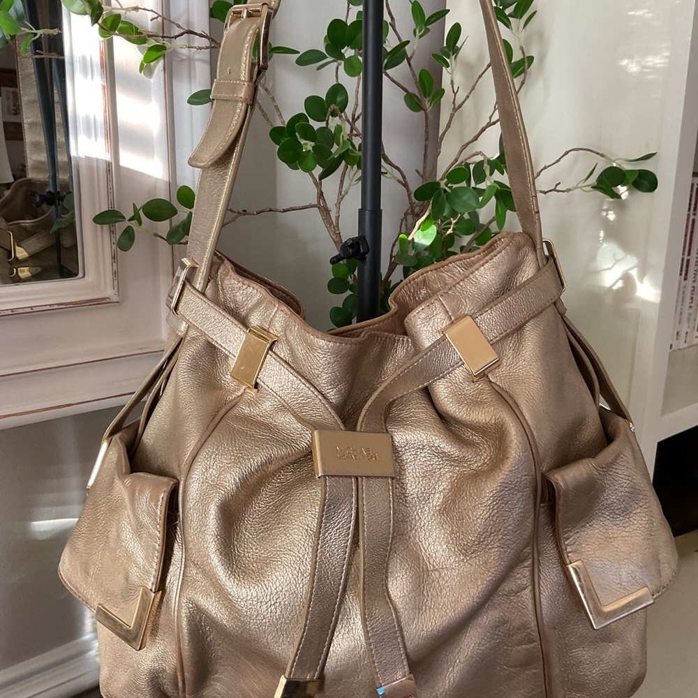 Michael Kors Gold Beverly leather bag.